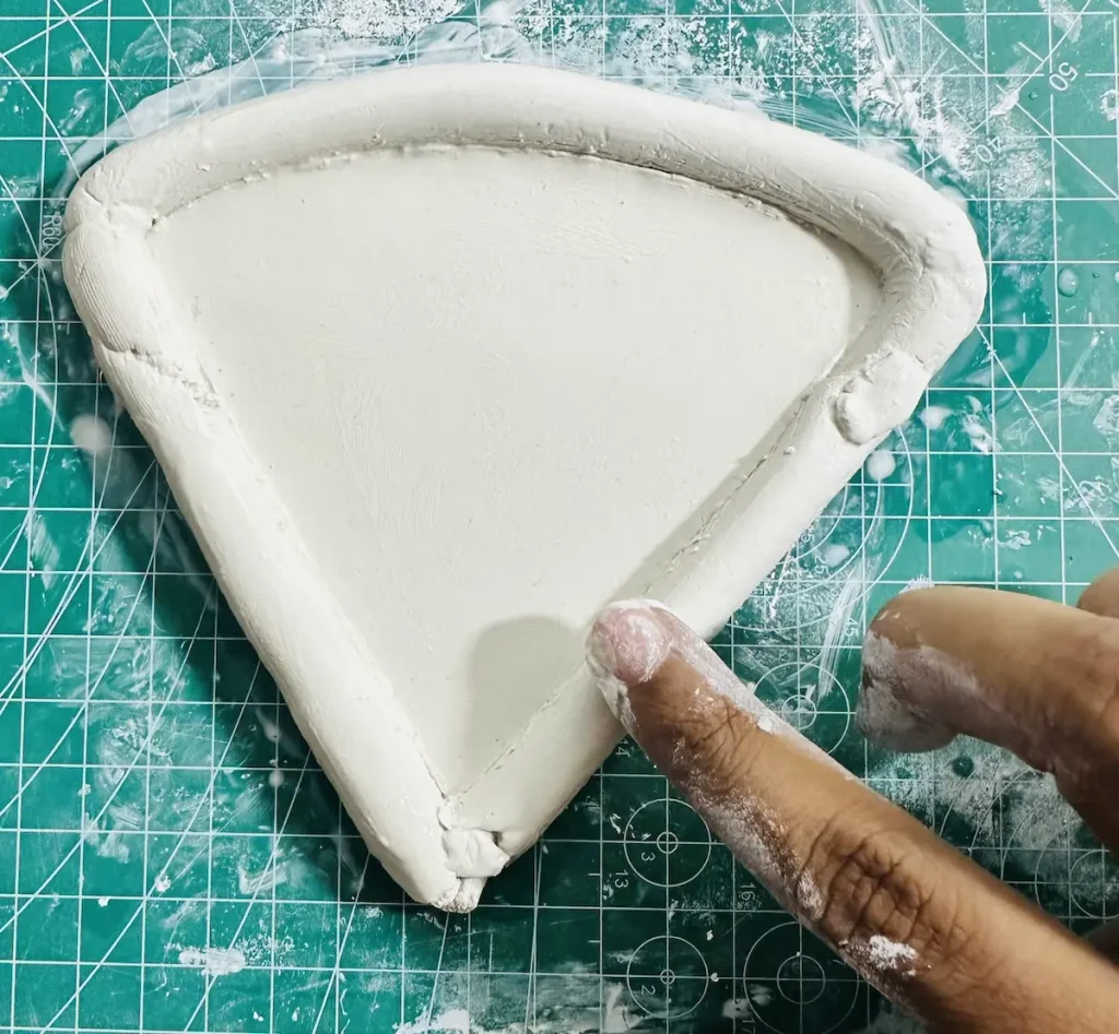 smoothing out the tray rim