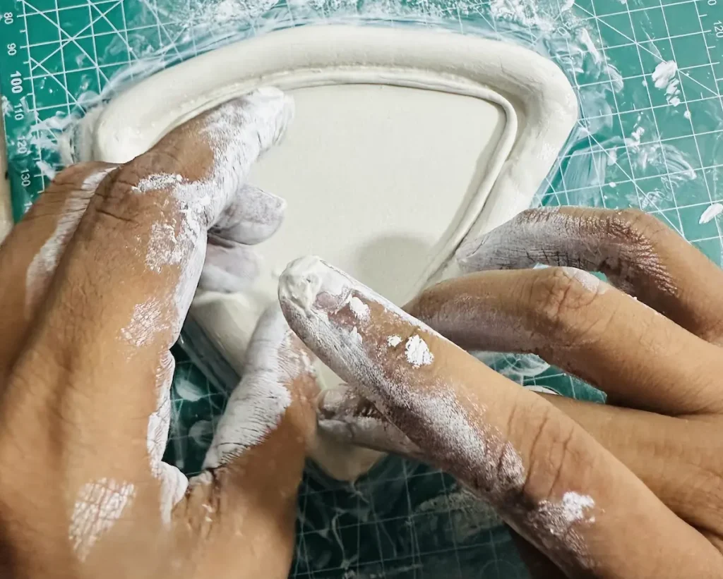 attaching the clay coil