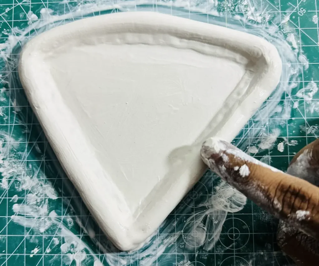 smoothing the tray