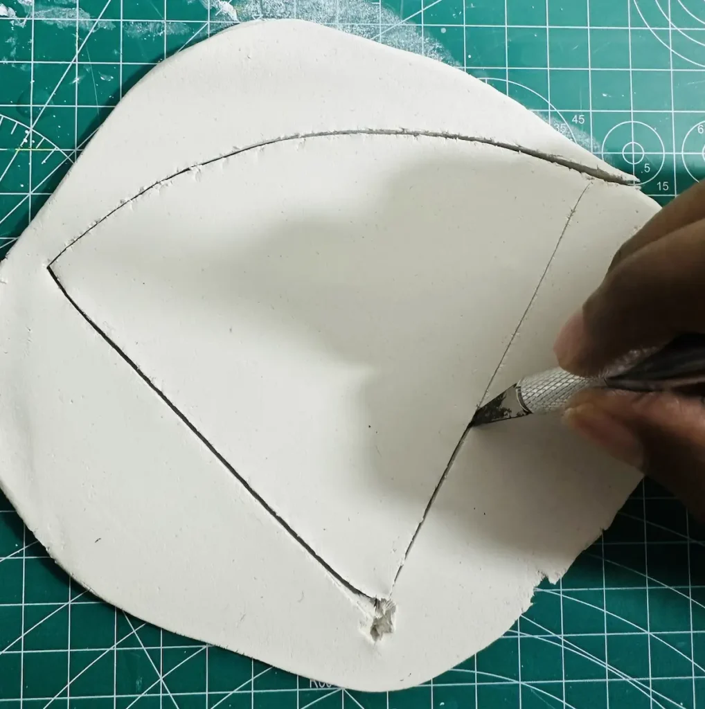 cutting the watermelon tray base