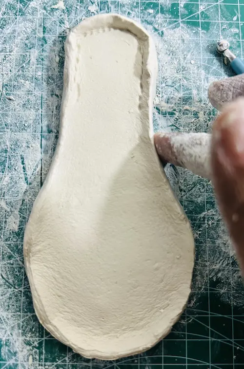 Smoothing papaya tray edges