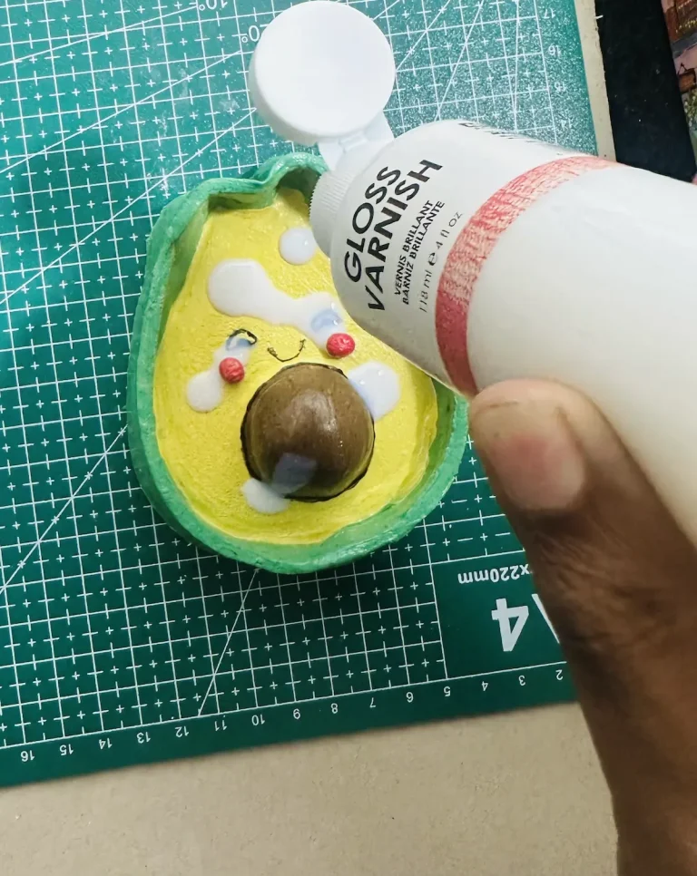 applying gloss varnish to the trinket tray
