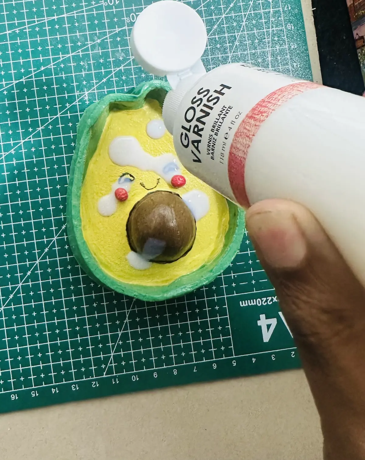 applying gloss varnish to the trinket tray