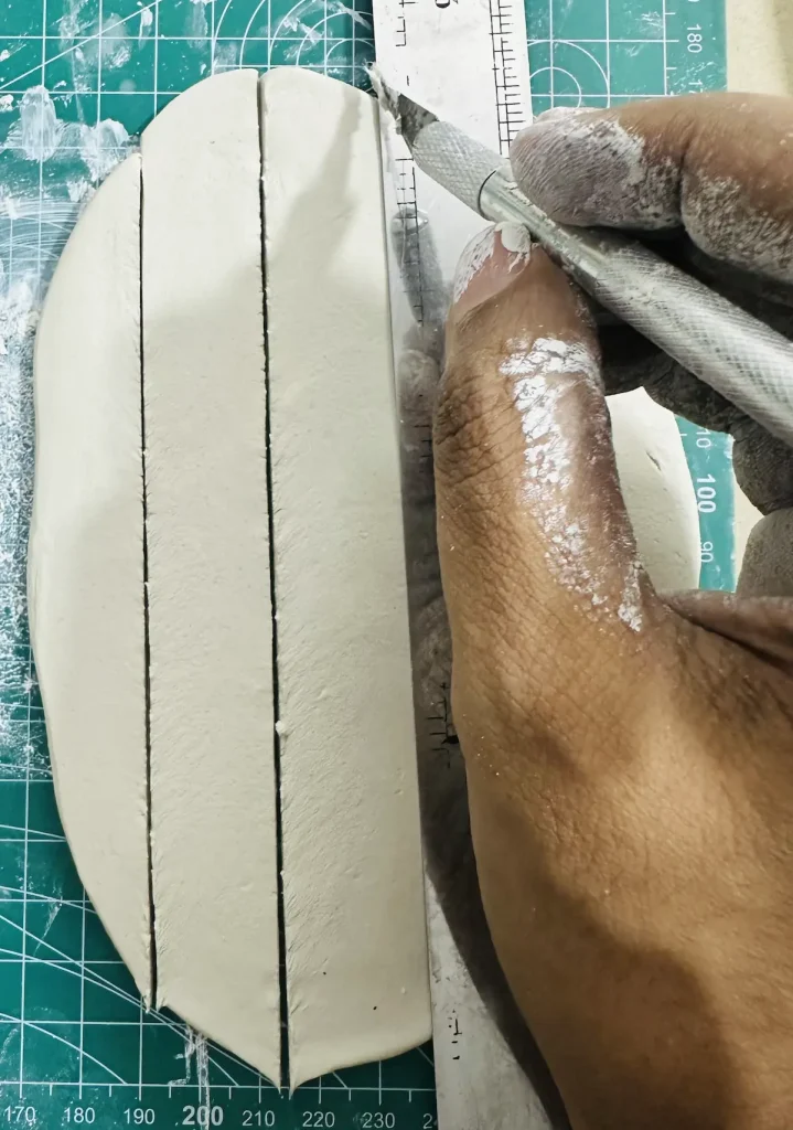 cutting clay straps in equal width