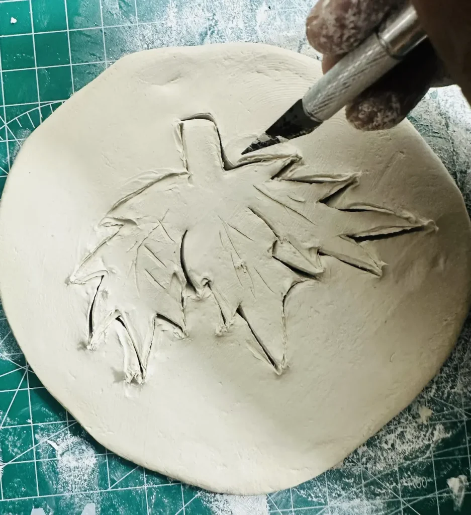 cutting the strawberry leaves