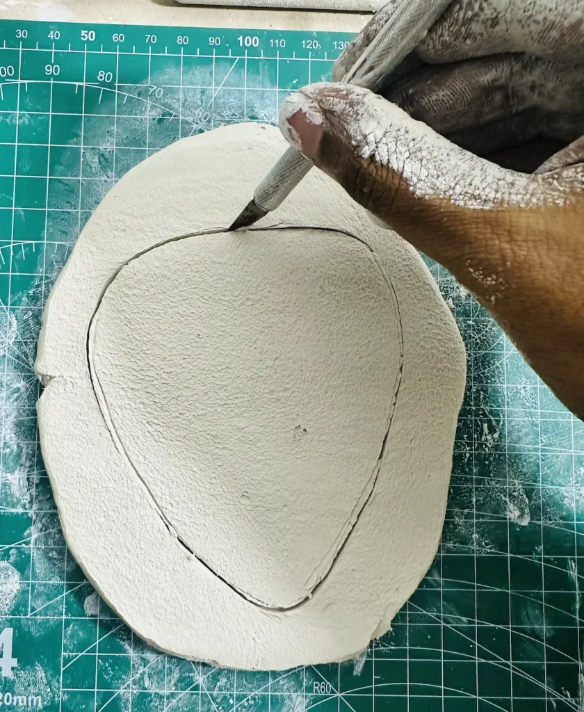 cutting the tray base