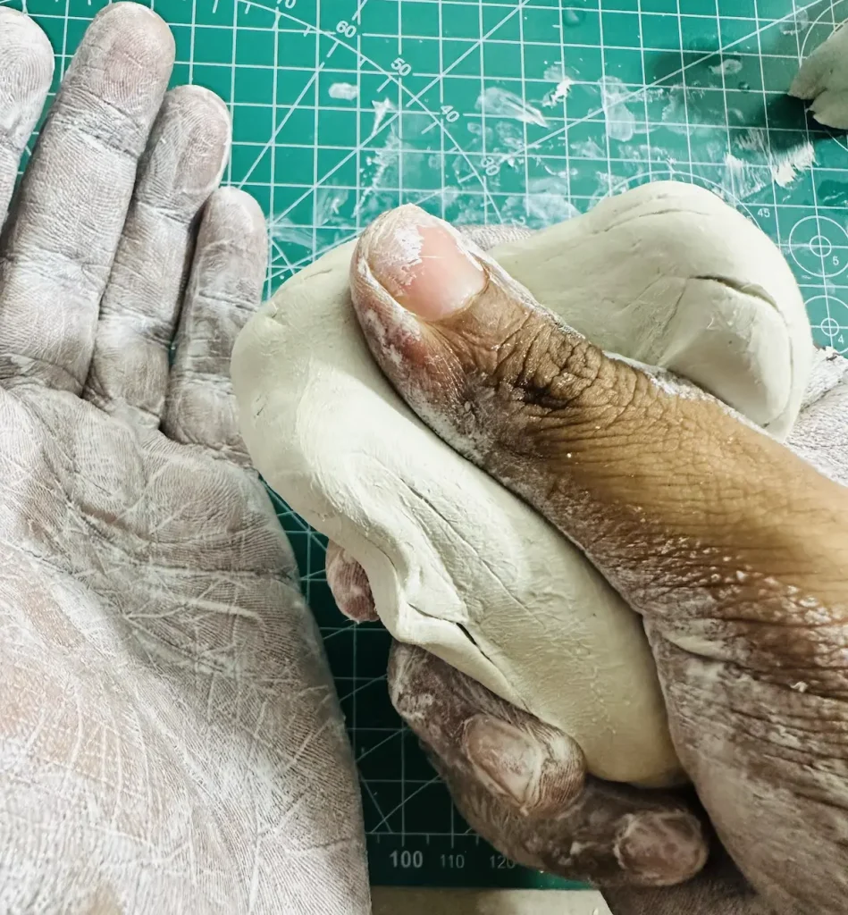 kneading clay