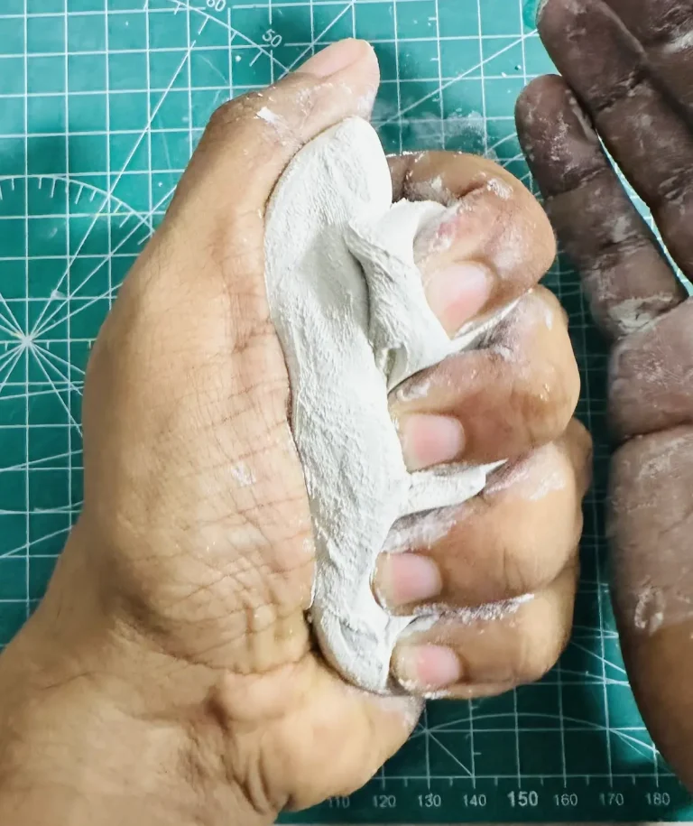 kneading the clay