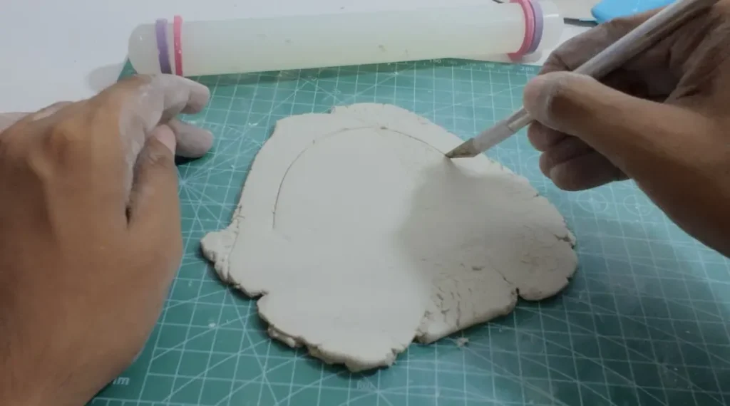 marking and cutting the shape of tray base