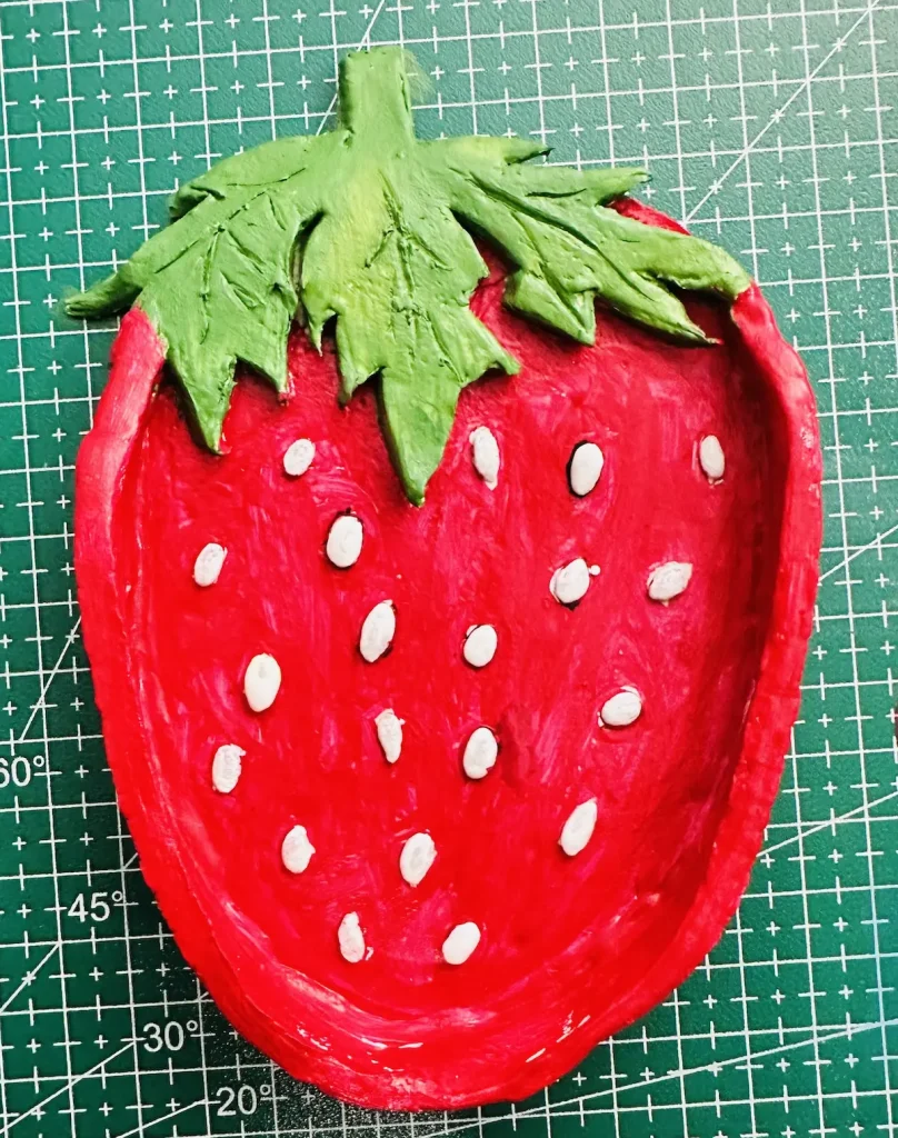 painted strawberry trinket tray before drying