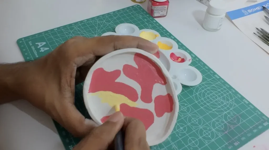 painting with yellow