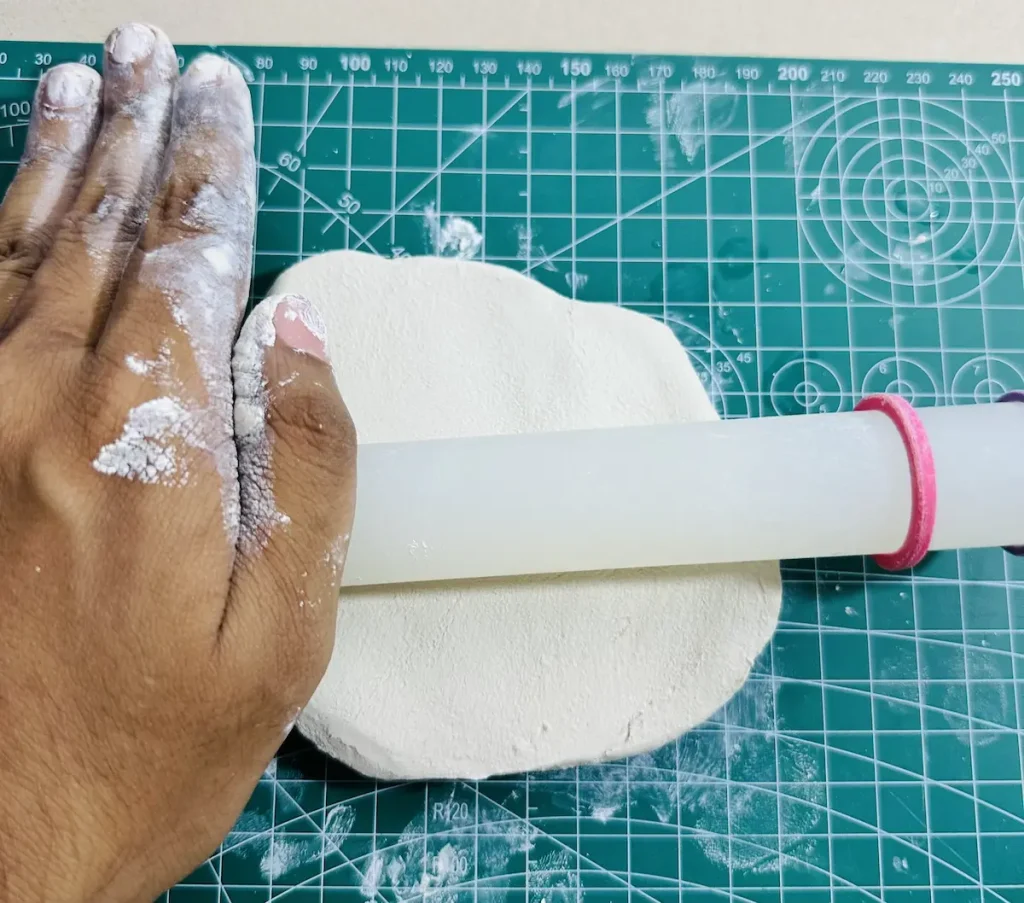 rolling the clay