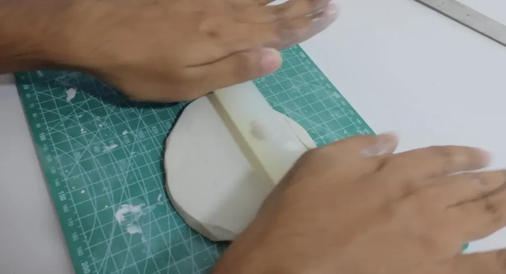 rolling the clay