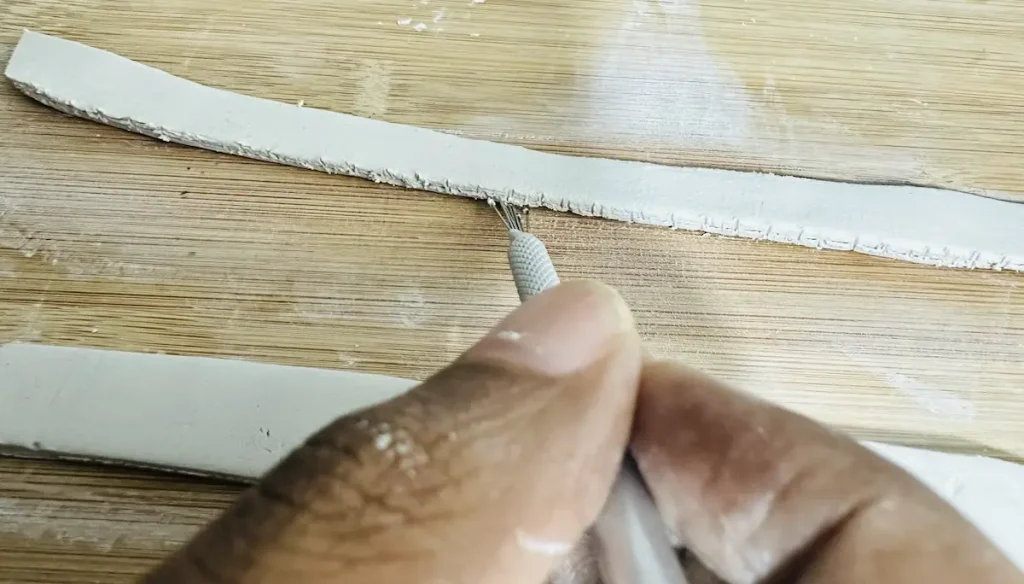 scoring tray rim before attach to the tray base