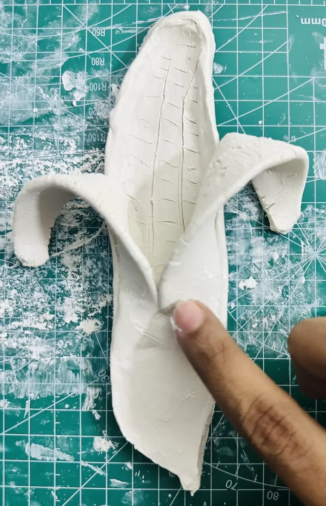 smoothing the banana peel-base joint