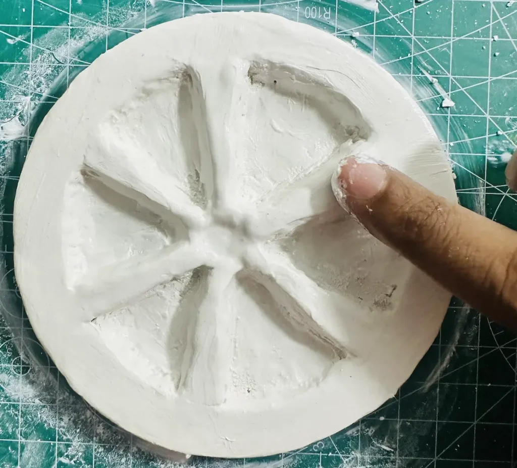 smoothing the orange trinket tray