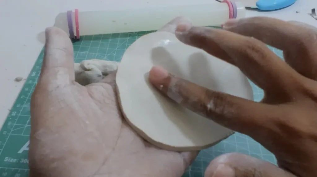 smoothing the surface with water