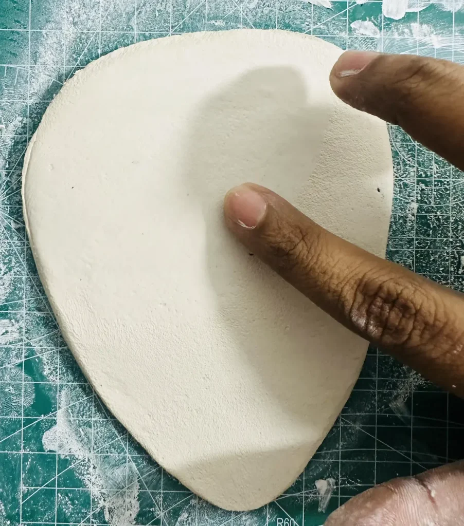 smoothing the tray base surface