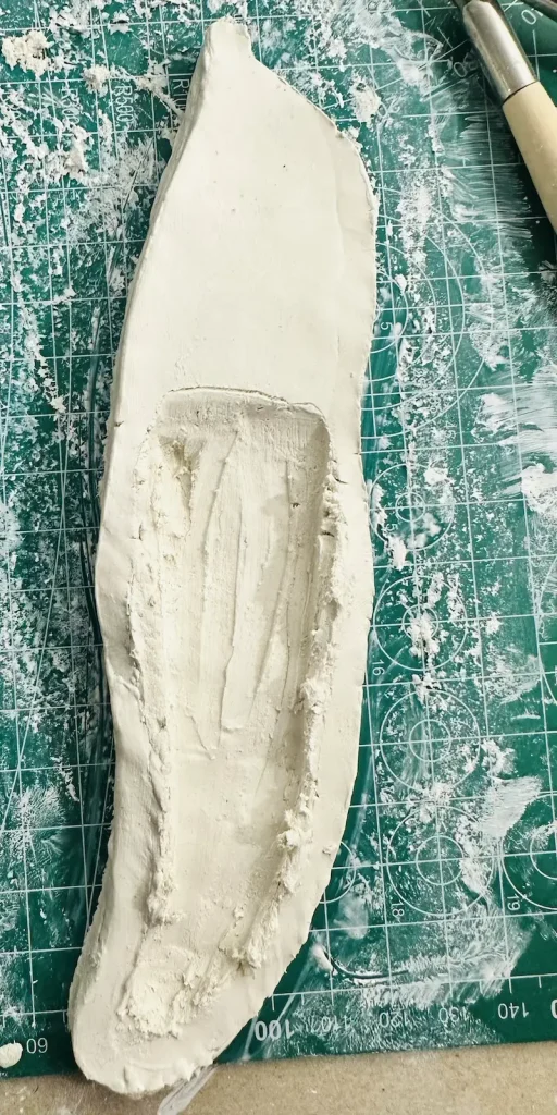 tray base after scooping out the clay