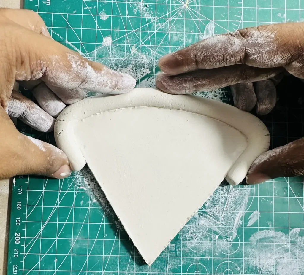 you can see cracks form when benging the thick clay slab