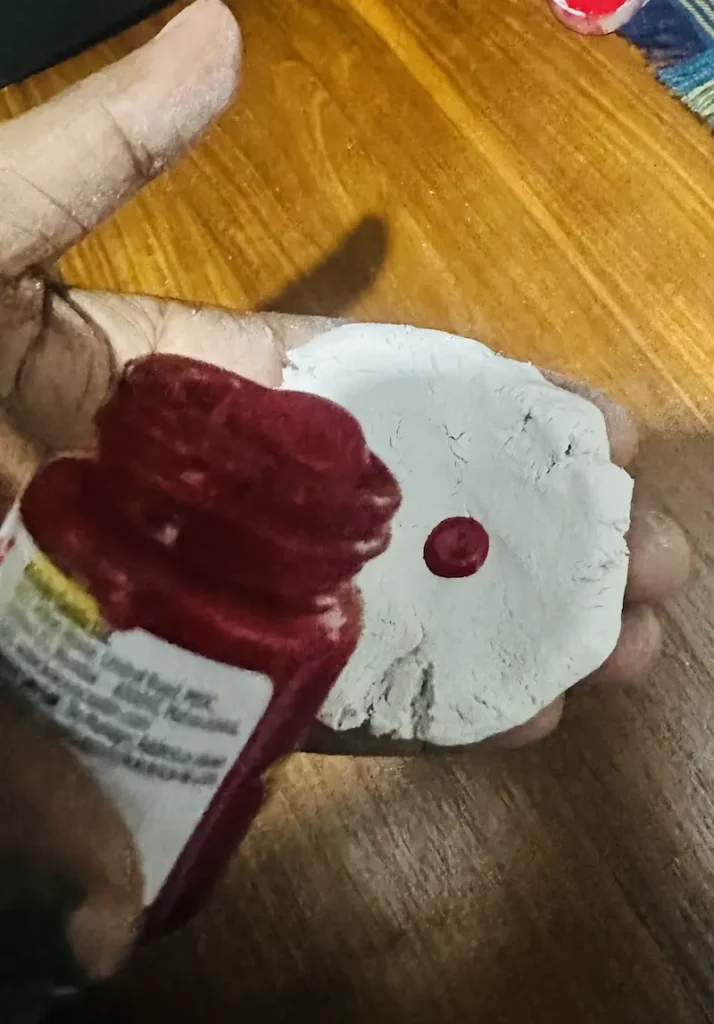 adding acrylic drops to the air dry clay piece