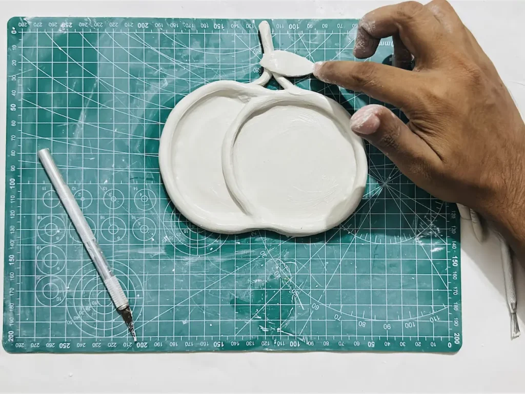 attaching cherry leaf to the stem