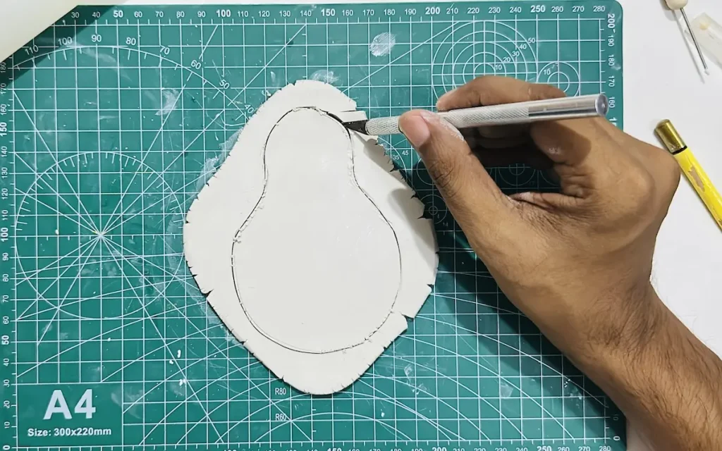 cutting the pear shape tray base