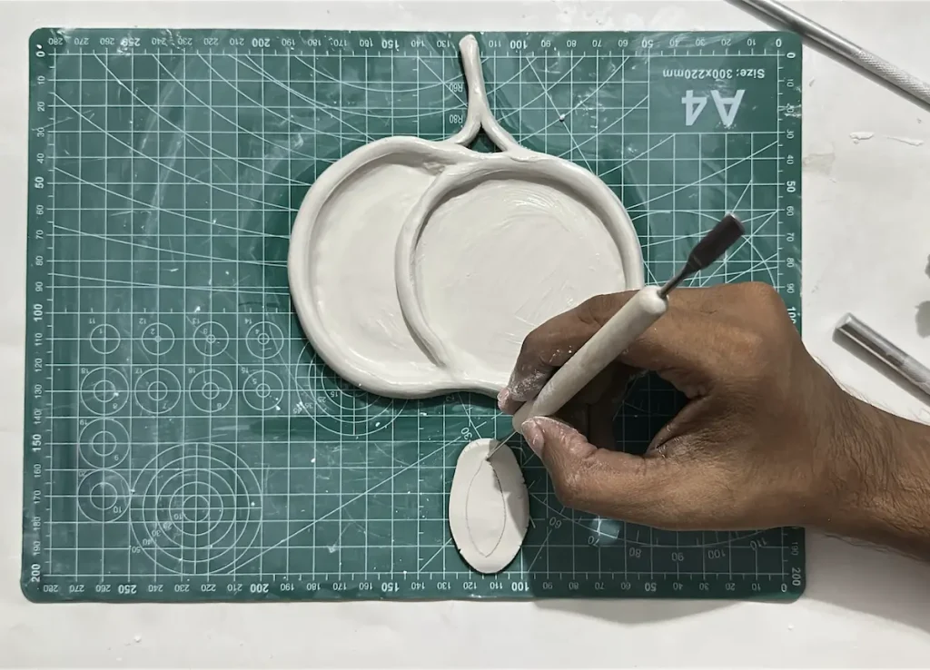 cutting the shape of cherry leaf