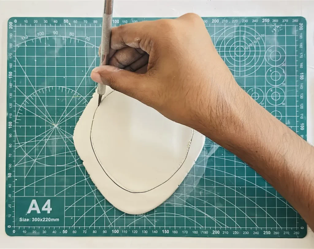 cutting the tray base
