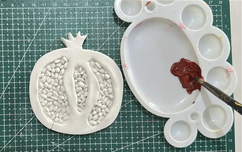 mixing the acrylic paint for the outer shell
