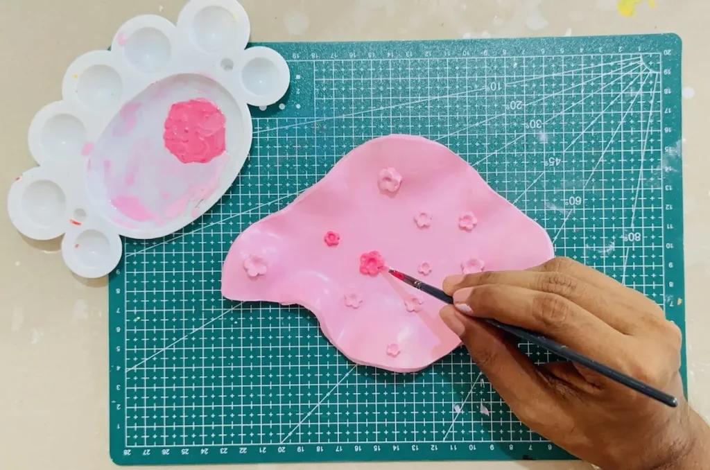 painting the clay flowers