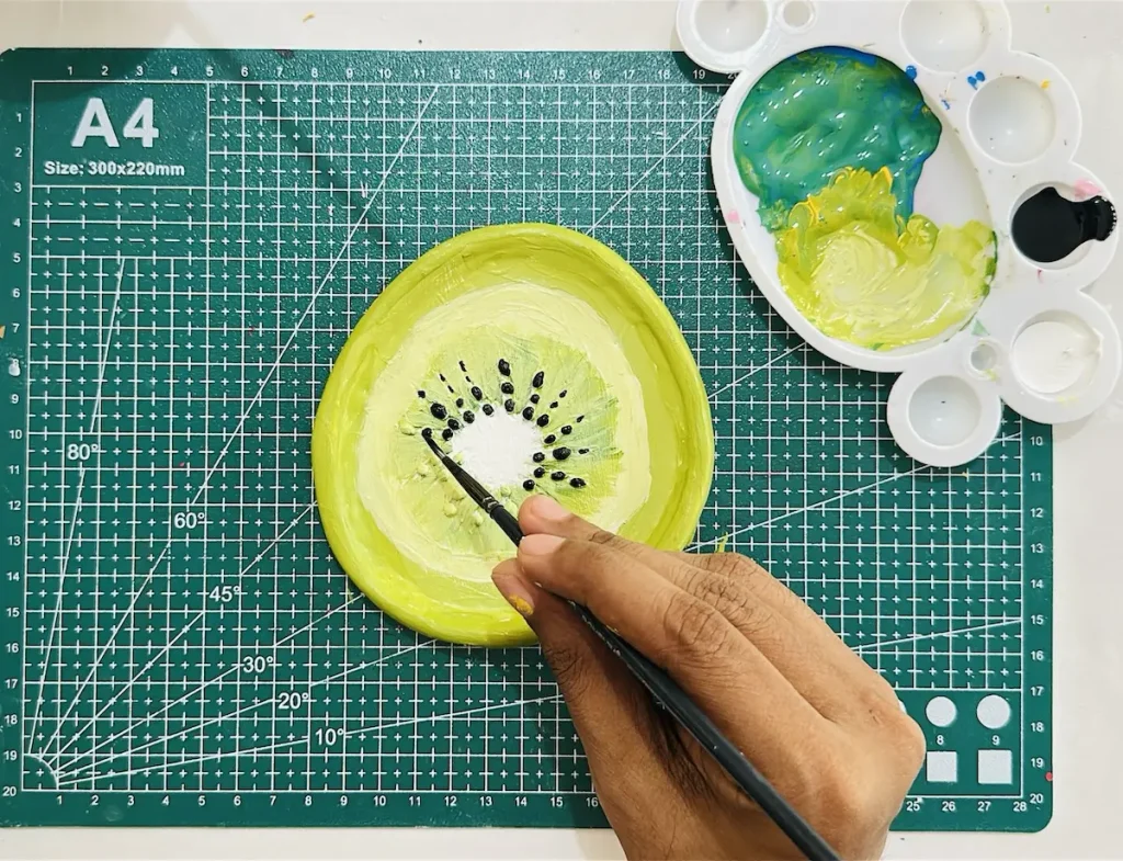 painting the kiwi seeds