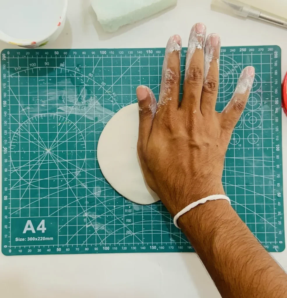 preparing the clay for rolling
