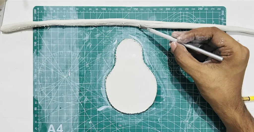 scoring tray rim before attach