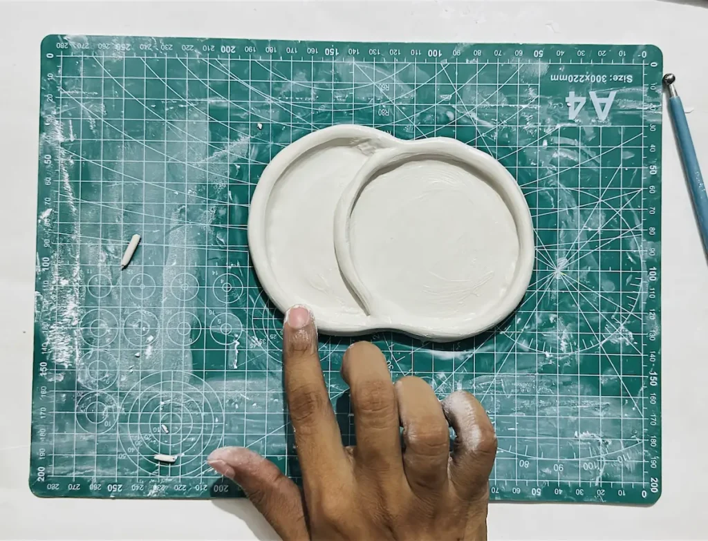 smoothing out the tray