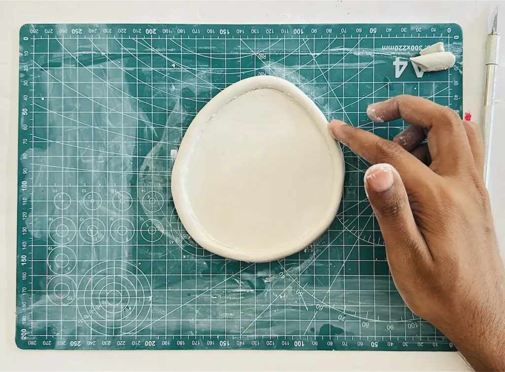 smoothing out the tray rim
