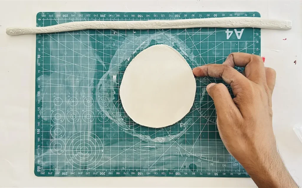 tapping water over the scored tray rim surface