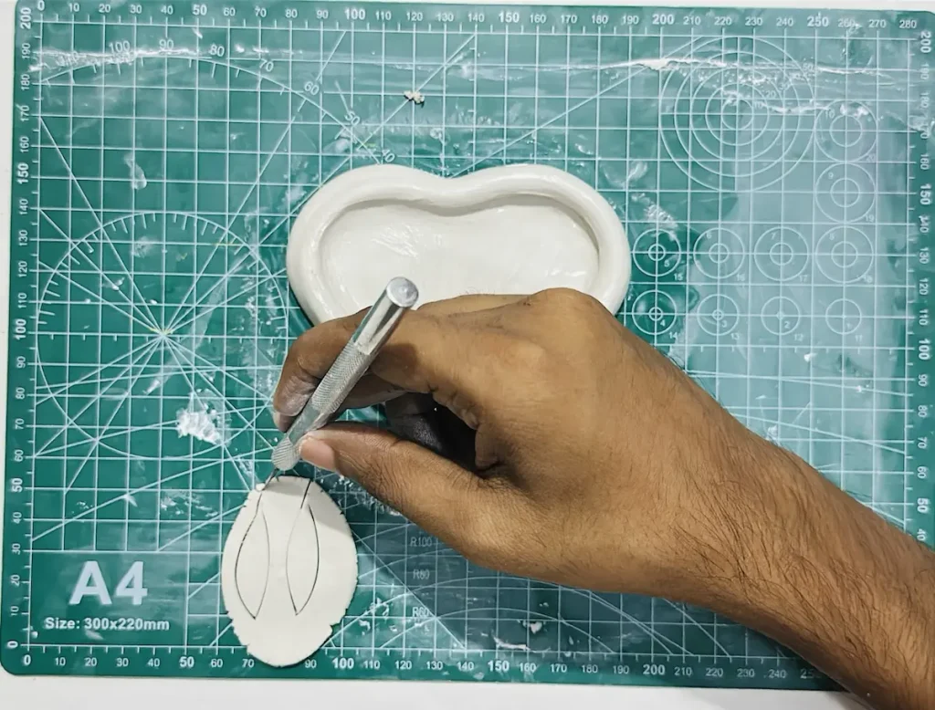 cutting the shape of the leaves