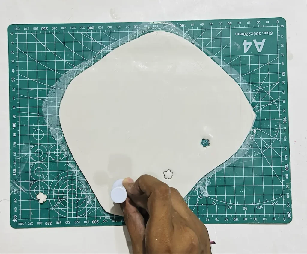 detailing the clay slab with flowers