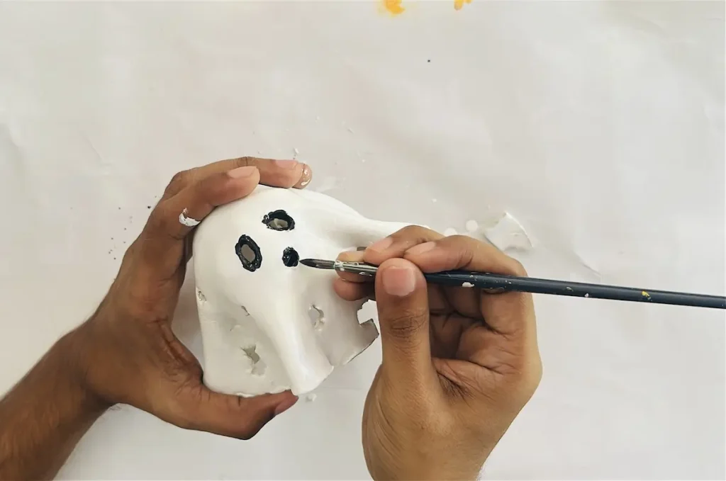 detailing the mouth and eyes of the ghost