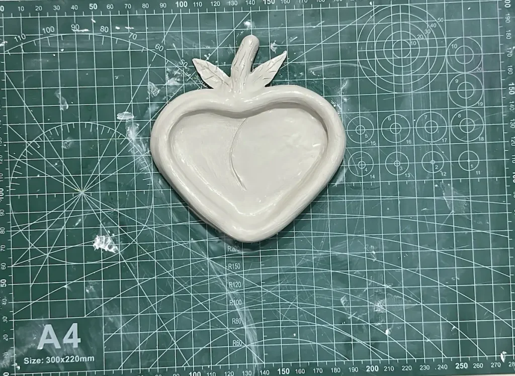 peach trinket tray before drying