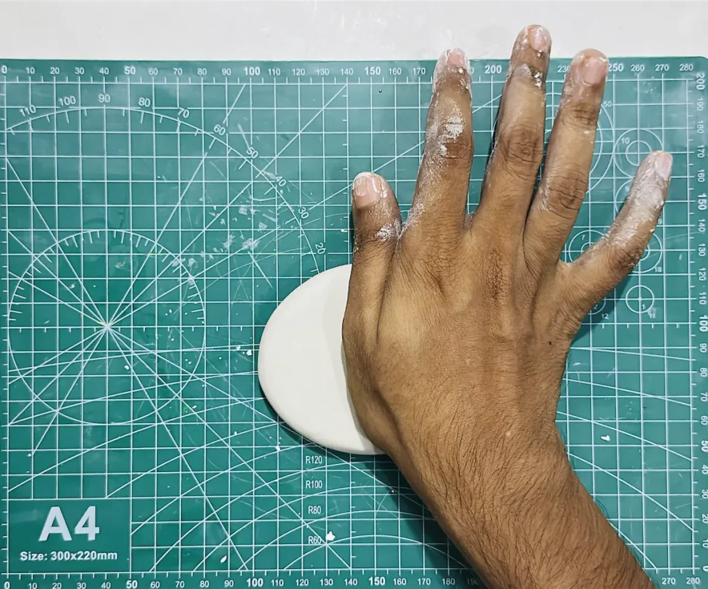 readying clay for rolling