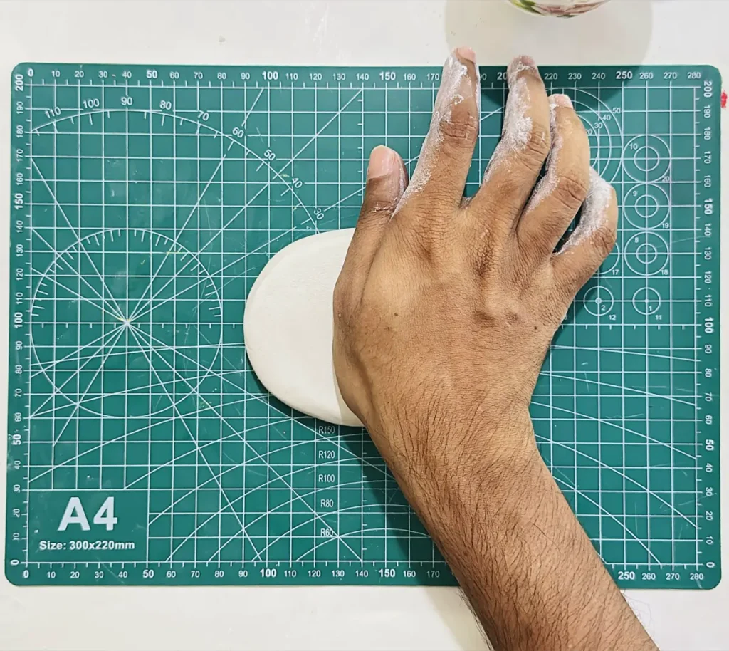 readying the clay for rolling