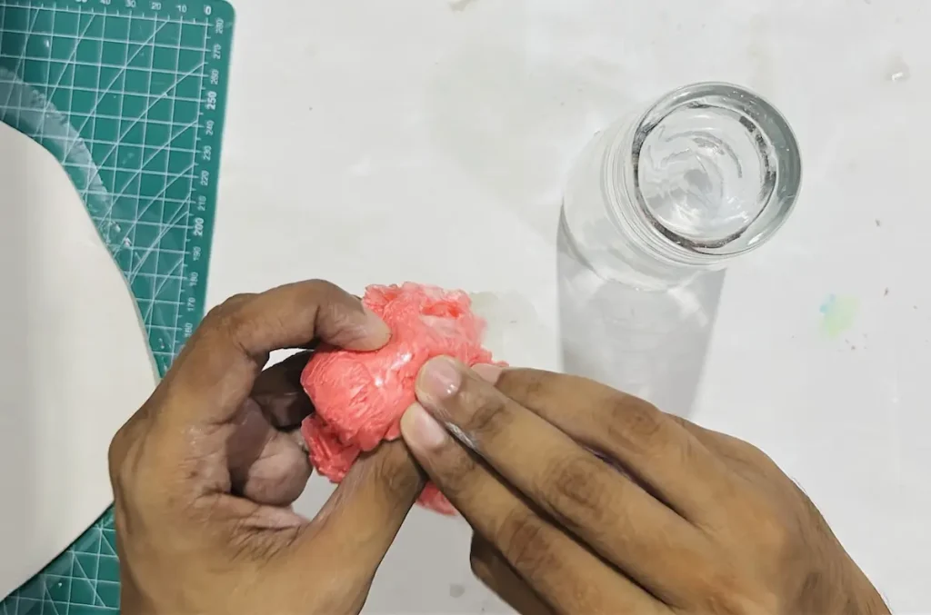 rolling the polythene to a ball shape