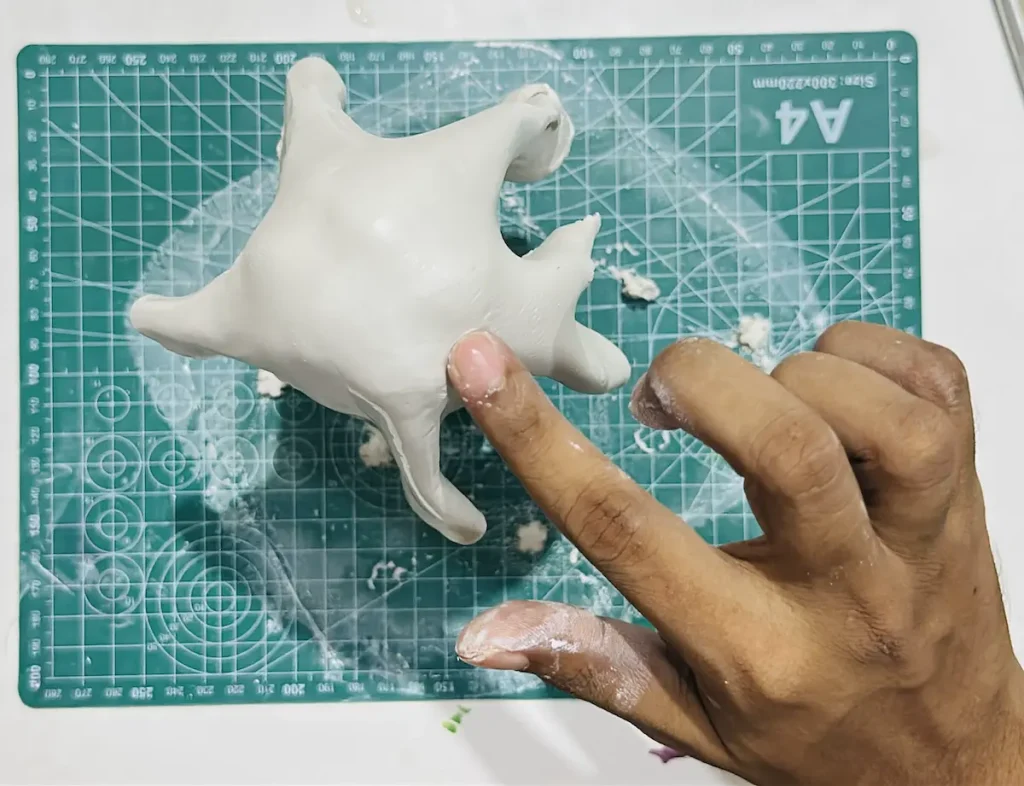 smoothing out the clay ghost