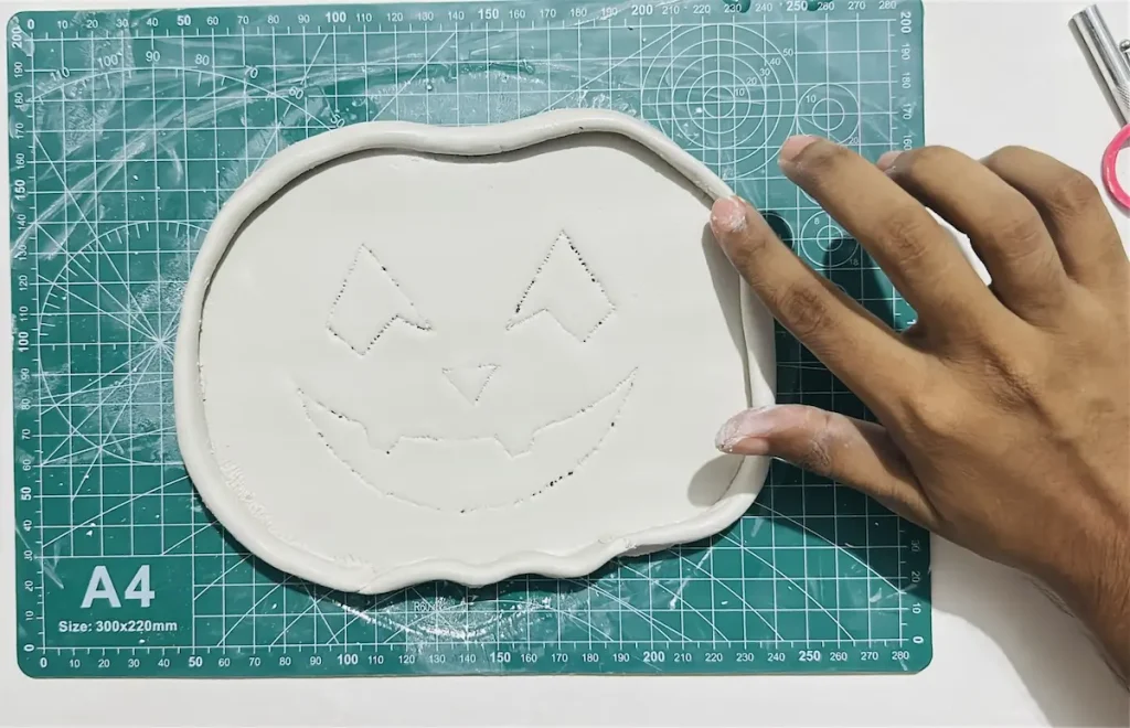 smoothing out the tray rim